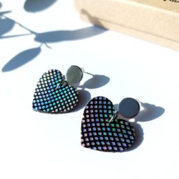 boucles d'oreilles en forme de coeur avec cuir disco