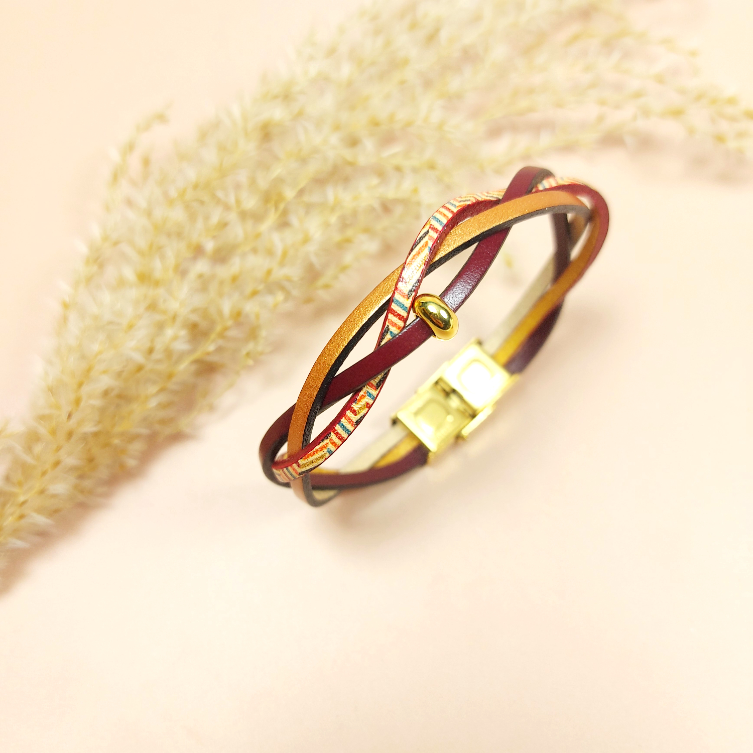 Bracelet en cuir 3 brins prune, bronze et multicolore rayé